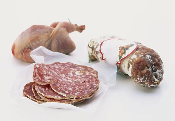 France, sliced meat, whole raw chicken and packaged saucisson