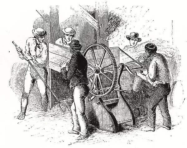 Hand-powered threshing machine by Barrett, Exall & Andrews. These machines were more