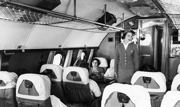 A stewardess and passengers aboard a tu-114 airliner (at the time, the worlds largest), 1959