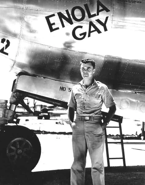 World War II: Paul Tibbets standing in front of the B-29 Enola Gay, the plane he