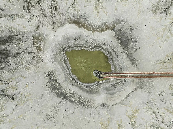 Drone shot looking down on a pool of water in a mine, Western Australia, Australia