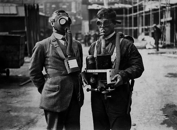 Gas Masks. 1929: A gas mask and a diving mask being demonstrated at the