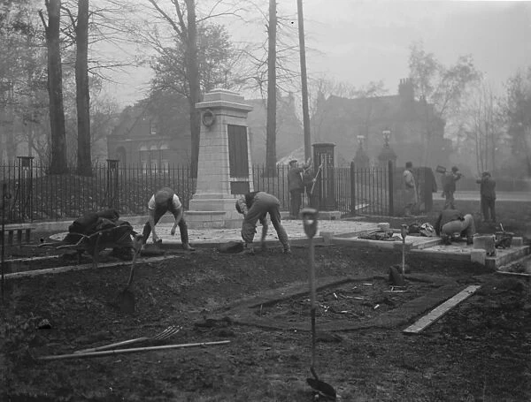 Workers finishing repair work at the Sidcup memorial, Kent. 1936