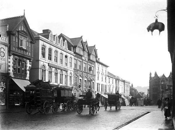 Horse drawn vehicles, Boscawen Street, Truro, Cornwall. Around 1910