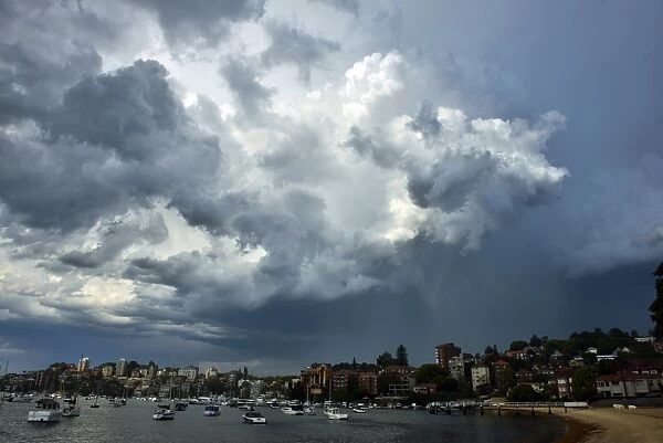 Australia-Weather. Storm clouds gather over the eastern suburbs of Sydney on October 12