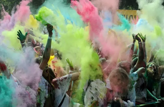 Framed Print : Coloured Powder Throw during the Festival of Colours in St