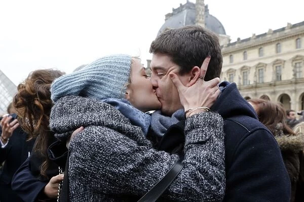 A couple kisses during a flashmob in Paris on February 14, 2014, to mark the launch