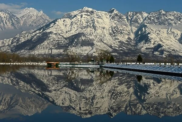 Dal Lake Snow Covered Mountain Reflection