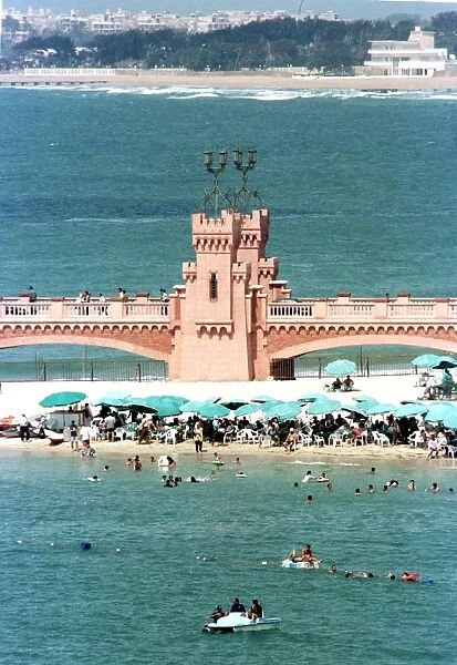 Egypt-Alexandria. Egyptian holiday makers enjoy swimming at the Royal beach