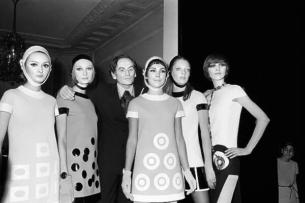 Fashion-Cardin. French designer Pierre Cardin is flanked by fashion models