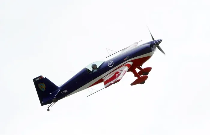 Framed Print : Fighter pilot and aerobatic, Captain Pierre Varloteaux performs in his Extra 330