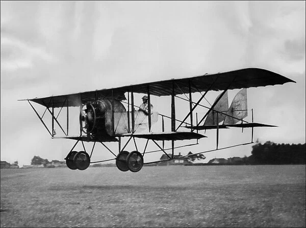 Flying-Ken Waller. British aviator Ken Waller at controls of a Caudron