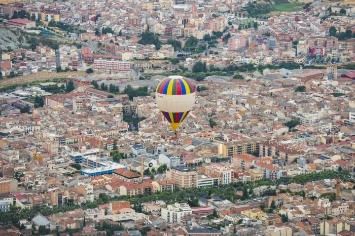 Framed Print : A hot-air balloon flies over Igualada, near Barcelona, during the 21th European Balloon Festival