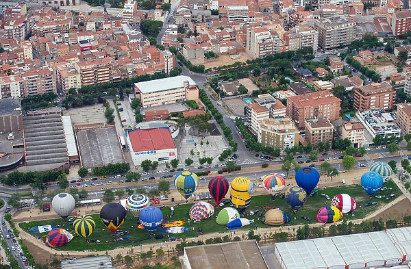 Hot-air balloons are inflated on ground during the 21th European Balloon Festival in Igualada
