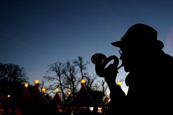 Hunters blow the hunting horn at the annual Christmas Market at the castle of Goedens in Sande