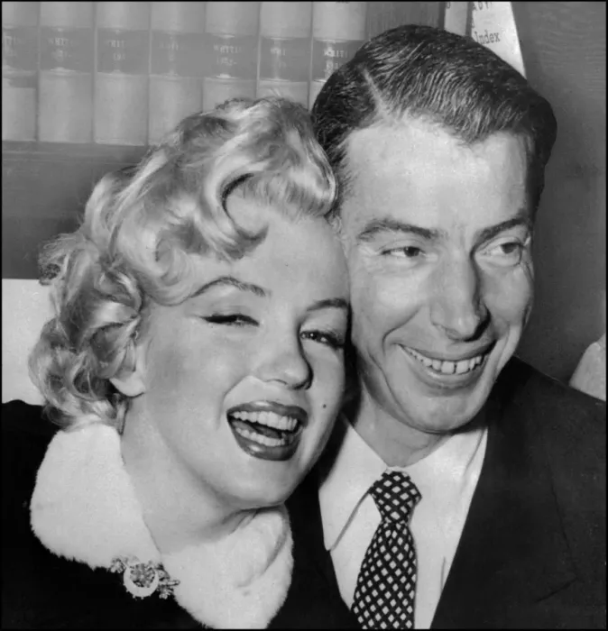 Framed Print : Marilyn Monroe with Joe DiMaggio during their wedding ceremony Framed Print : Marilyn Monroe with Joe DiMaggio during their wedding ceremony
