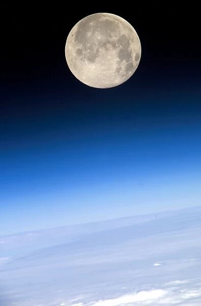 Full Moon; view above Earths horizon and airglow