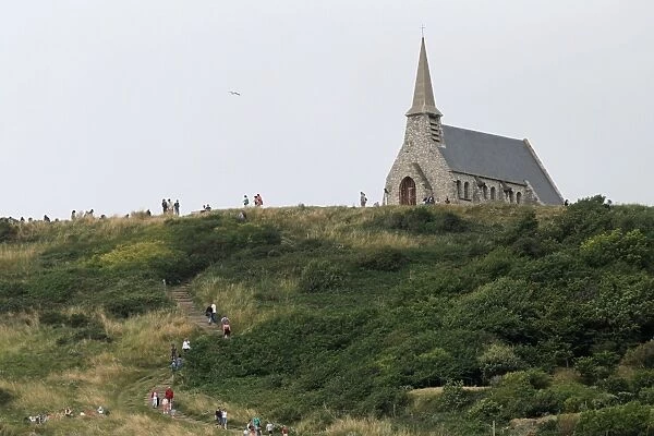 The Notre-Dame-de-la-Garde chapel, perched on the cliffs of Etretat, is pictured on July 20