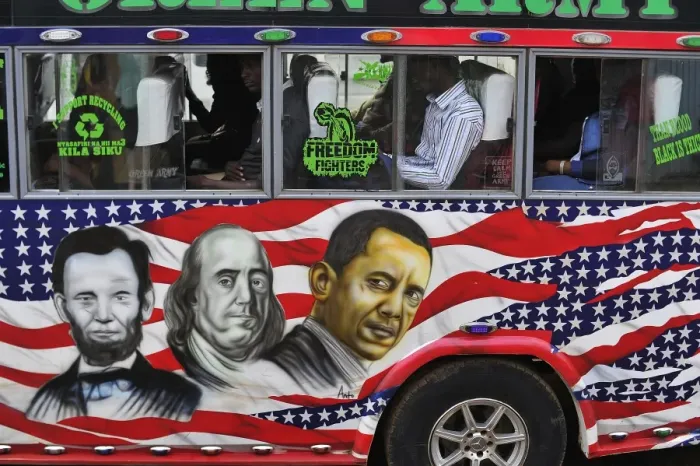 Framed Print : People sit in a matatu minibus with a painting depicting US Presidents Abraham Lincoln