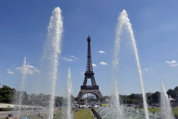 Framed Print : A picture shows a general view of the Eiffel tower on a warm and sunny day on July 3, 2014 in Paris Framed Print : A picture shows a general view of the Eiffel tower on a warm and sunny day on July 3, 2014 in Paris