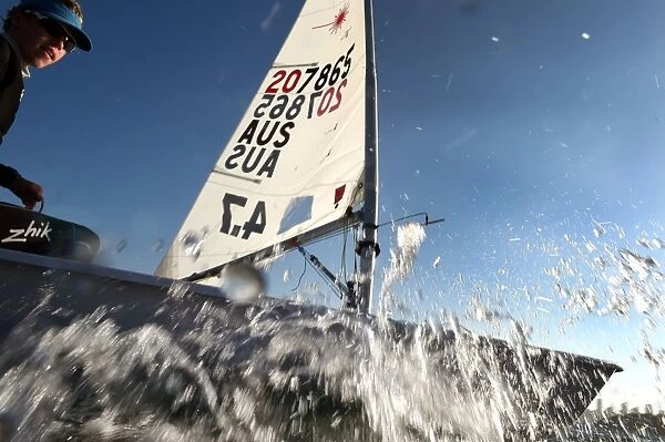 Sailing-Feature. Laser 4.7 dinghy sails on Sydney Harbour on February 19, 2016