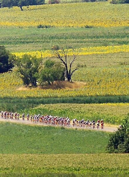 Tdf-Post Card. The cyclists of the 85th Tour de France pass through the