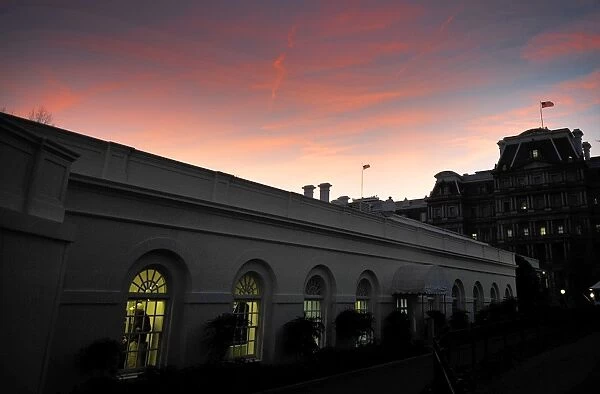 Us-West Wing. The sun sets over the Eisenhower Executive Office Building 