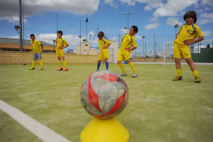Framed Print : Young players of the Ronda Union Deportiva football club take part in a training Framed Print : Young players of the Ronda Union Deportiva football club take part in a training