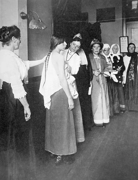European women undergo medical examination on Ellis Island, New York, c. 1900 (b  /  w photo)