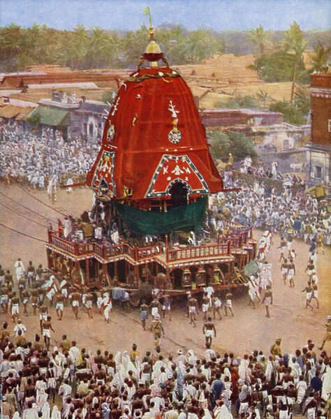 Massive car of the Hindu god Juggernaut, Lord of the World, being dragged by devotees, at Puri in Orissa, India (b  /  w photo)
