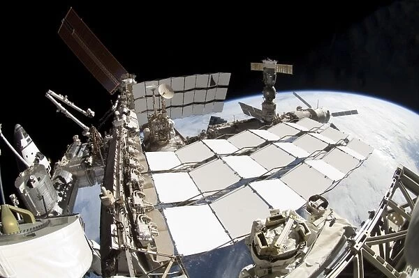 Fish-eye lens view of a portion of the International Space Station