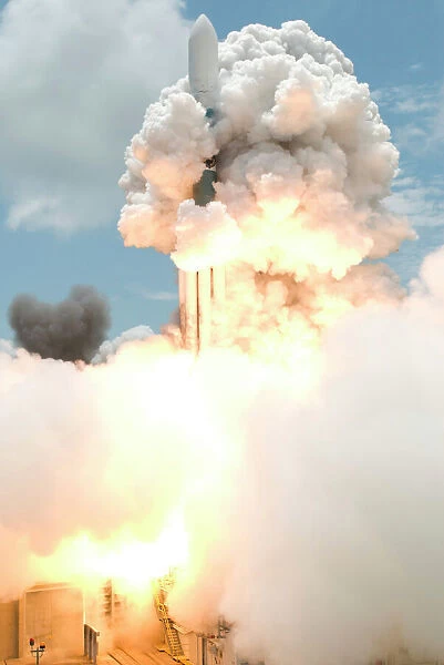 Smoke envelops the Delta II rocket