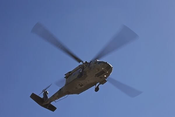 UH-60 Black Hawk helicopter flies overhead in New Mexico