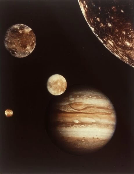 Colour composite of Jupiter and four moons. Creator: NASA