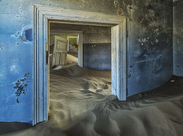 Drifting Sand Fills The Rooms Of A Colourful Abandoned House; Kolmanskop, Namibia
