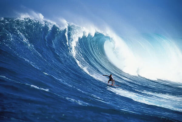 Hawaii, Maui, Peahi, Buzzy Kerbox Surfing Big Wave Curling And Crashing Behind