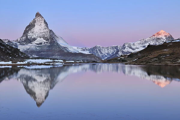 Matterhorn reflected in Lake Riffelsee at Dawn, Zermatt, Alps, Valais, Switzerland
