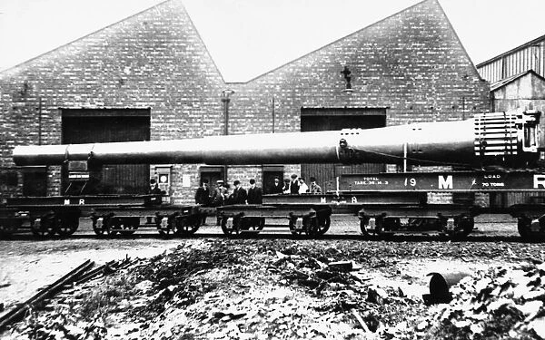 A 15 Naval gun is loaded on to a waiting train at The Royal Ordnance Works at Stoney
