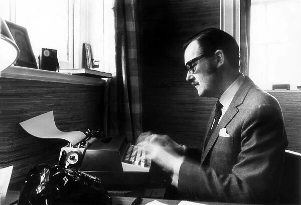 Alan Whicker TV Presenter in his office at his Regent