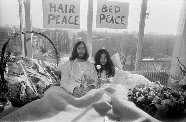 John Lennon and his wife Yoko Ono are having a weeks love-in their room at the Hilton