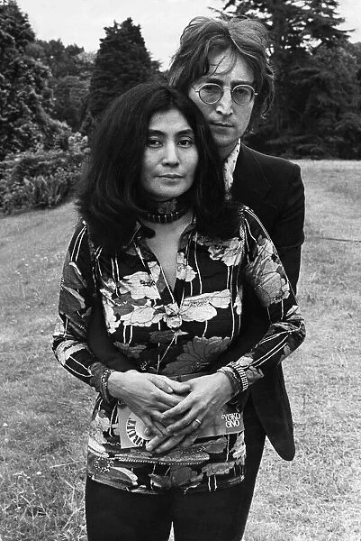 Former member of The Beatles pop group John Lennon pictured with his wife Yoko Ono at