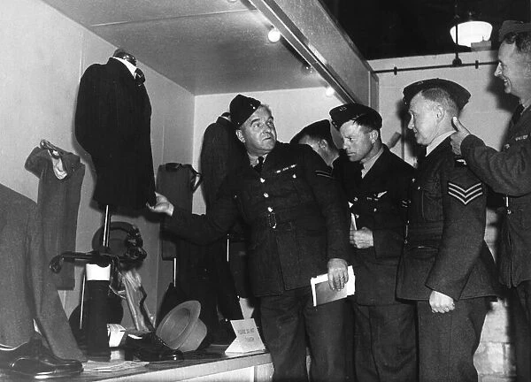 Members of the RAF get a preview of their 'demob'civvy clothing