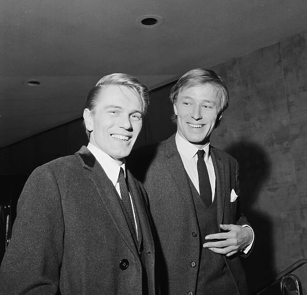 Pop singers Mike Sarne (right) and Adam Faith at the Empire Theatre in Leicester Square