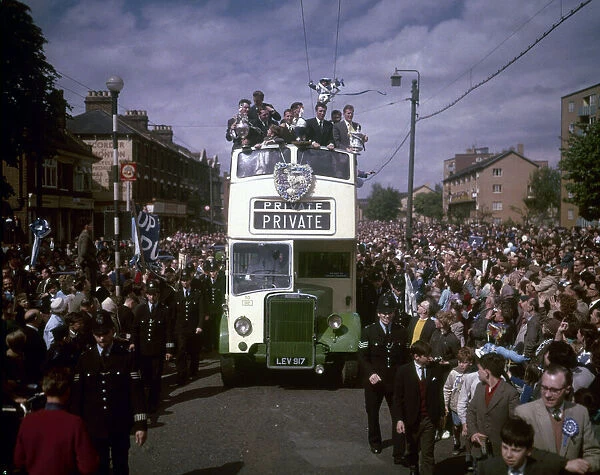Tottenham Hotspur team return to Tottenham in an open top double decker bus with the FA