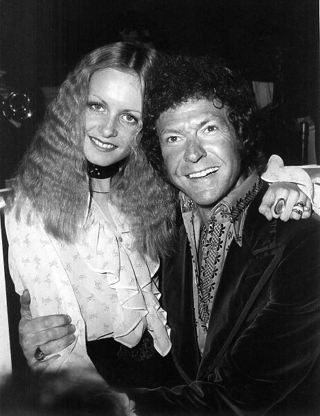 Twiggy, real name Lesley Hornby, with singer Joseph Ward at a reception at the Ritz Hotel