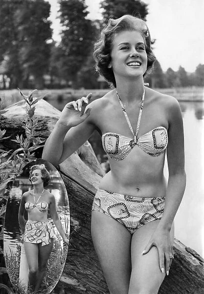 Woman wearing a bikni during a day out. July 1959 P018020