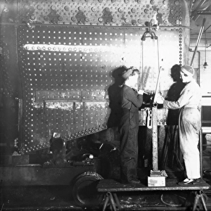Women working on a locomotive boiler in Swindon Work during WW2