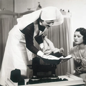Baby Weighed by Nurse