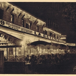 Exterior view of the Rotunde caf at night time in Paris, 19