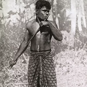 Man playing a flute, New Caledonia, south west Pacific